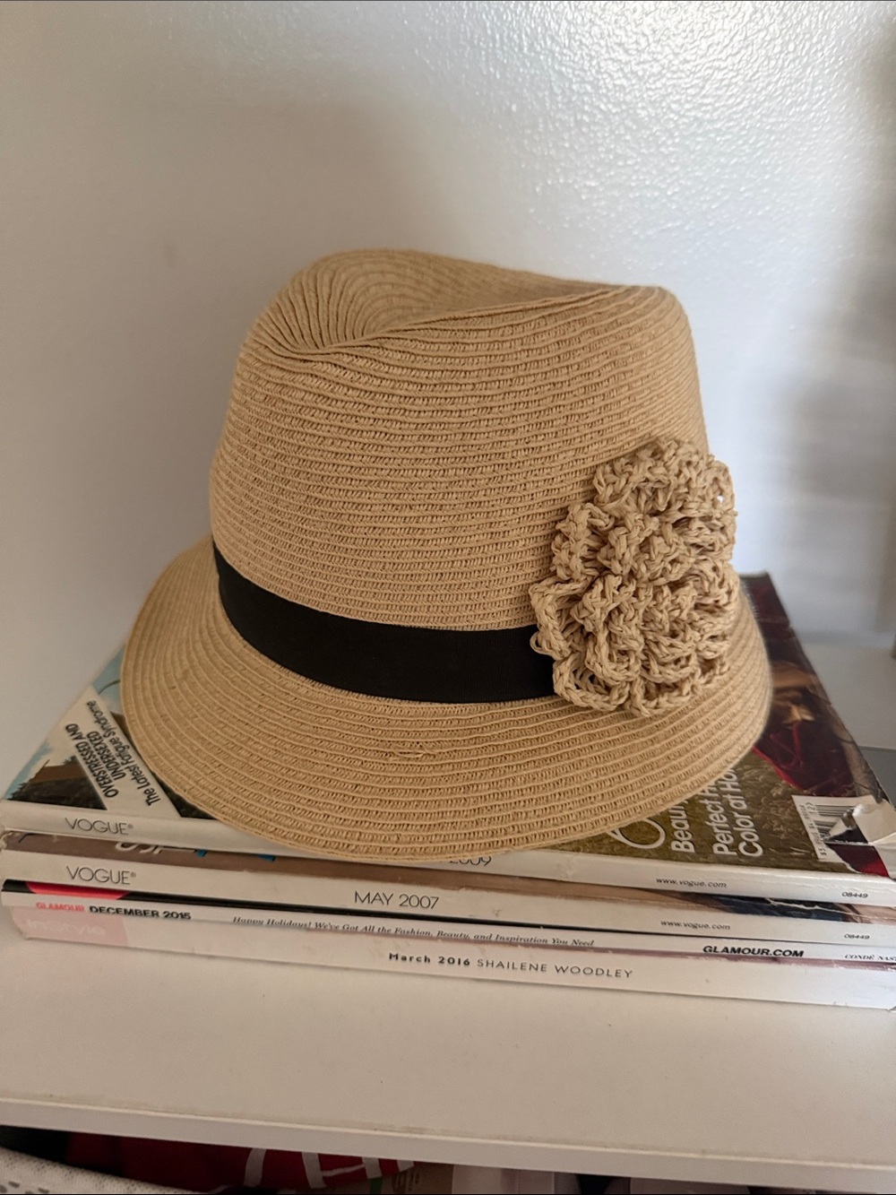 Tan Straw Cloche Hat with Black Band and Floral Accent